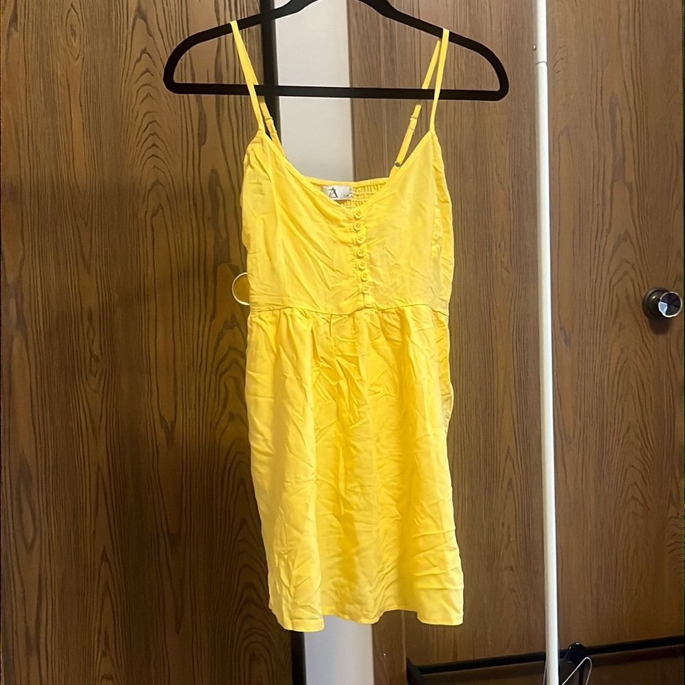 Yellow adjustable spaghetti strap dress with pockets